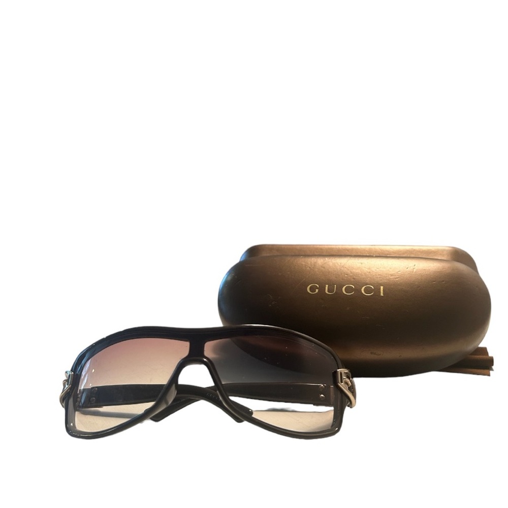 Gucci Shield Sunglasses with Buckle Detail.